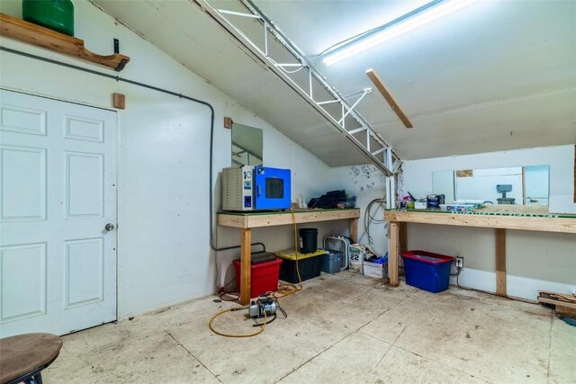 basement with a workshop area