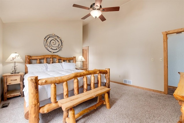 carpeted bedroom with ceiling fan and lofted ceiling