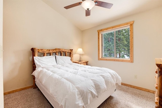 bedroom featuring ceiling fan, carpet, and vaulted ceiling