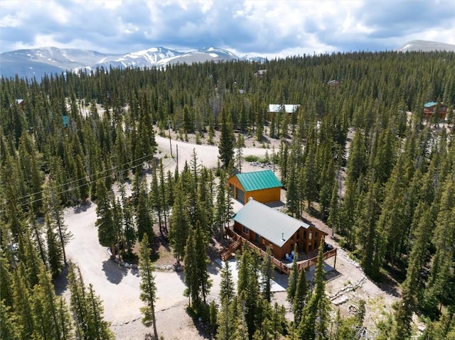 birds eye view of property featuring a mountain view