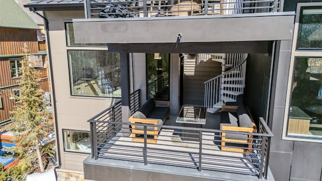 entrance to property featuring a balcony