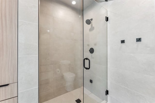 full bathroom with a stall shower