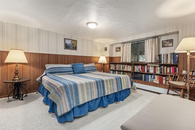 bedroom with wood walls