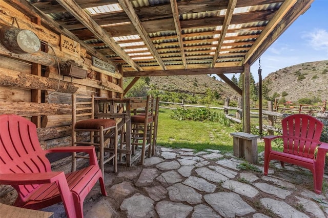 view of patio with a mountain view