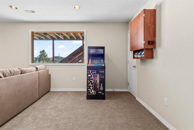 living room featuring light carpet