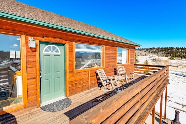 view of snow covered deck