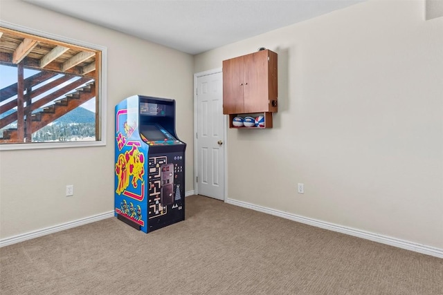 game room featuring light colored carpet