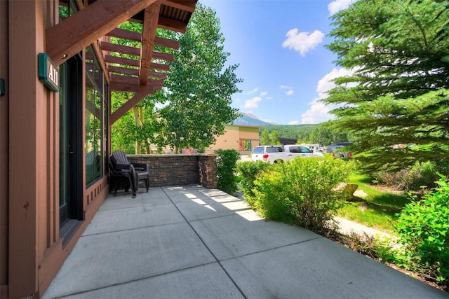 view of patio with a mountain view