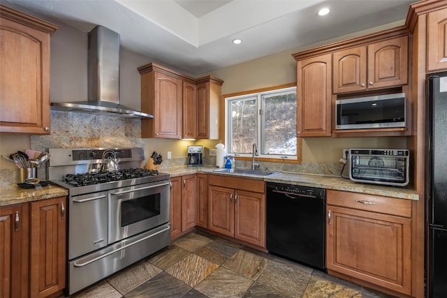 kitchen with sink, black appliances, light stone countertops, decorative backsplash, and wall chimney exhaust hood