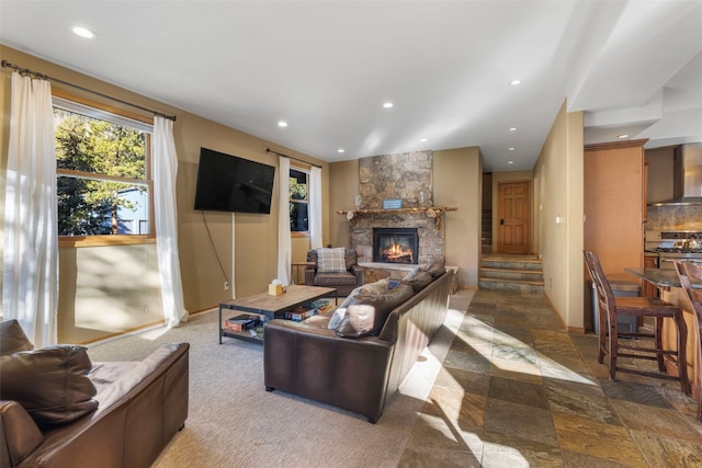 living room featuring a fireplace