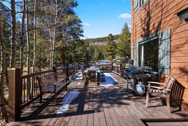 wooden deck with area for grilling