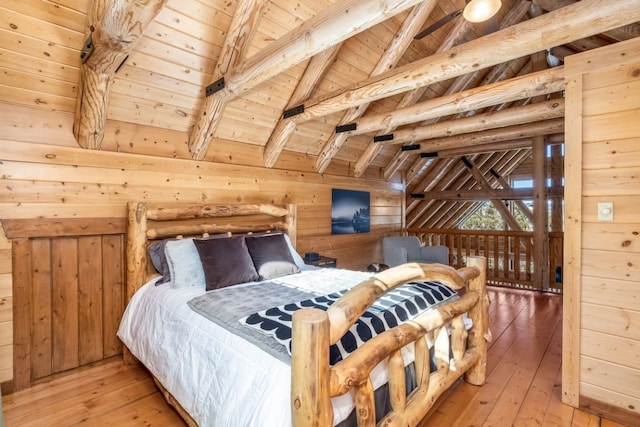 bedroom with wooden ceiling, wood walls, light wood-type flooring, and vaulted ceiling with beams