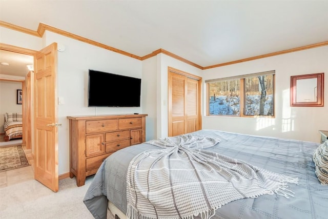 bedroom with light colored carpet, ornamental molding, and a closet