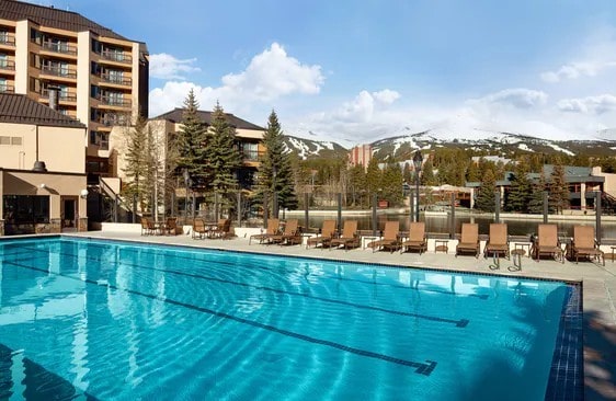 view of pool with a patio and a mountain view