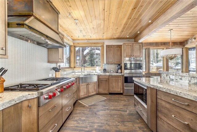 kitchen featuring appliances with stainless steel finishes, premium range hood, dark wood-type flooring, decorative light fixtures, and wooden ceiling