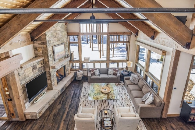 unfurnished living room with vaulted ceiling with beams, a fireplace, wood ceiling, and dark wood-type flooring