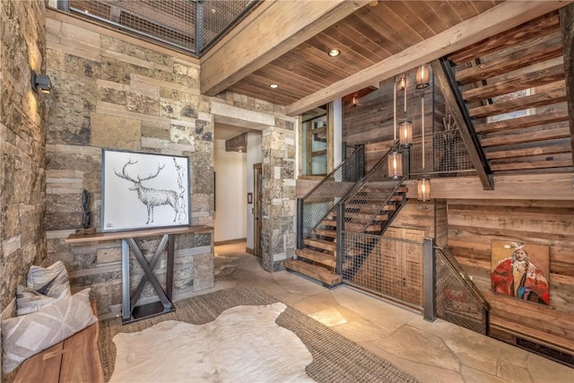 interior space featuring beam ceiling and wood ceiling