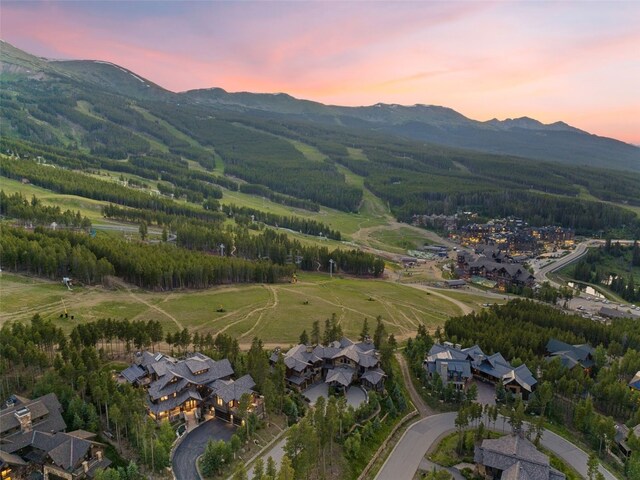 aerial view at dusk with a mountain view