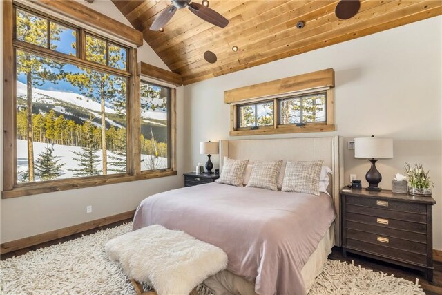 bedroom featuring wood-type flooring, ceiling fan, lofted ceiling, and wood ceiling