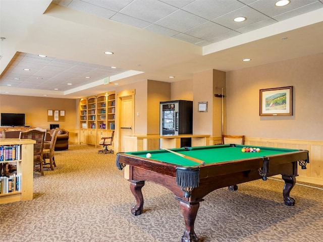 rec room featuring built in features, a tray ceiling, carpet floors, and pool table