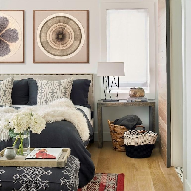 bedroom with wood-type flooring