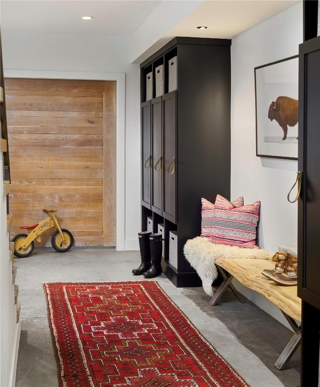 living area featuring concrete floors