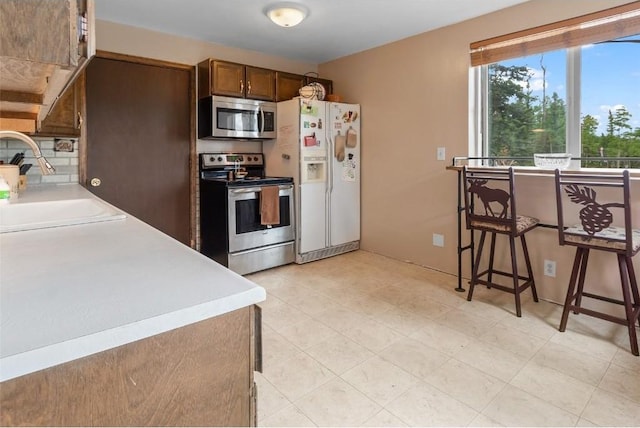 kitchen with sink and stainless steel appliances