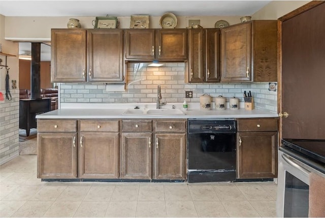 kitchen featuring sink, electric range, dishwasher, and tasteful backsplash