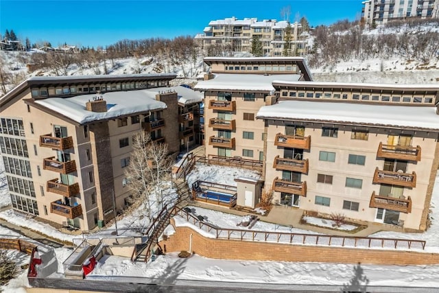 view of snow covered property