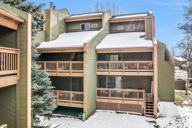 view of snow covered property