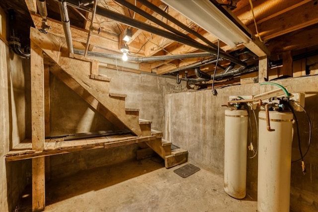 unfinished basement with stairway