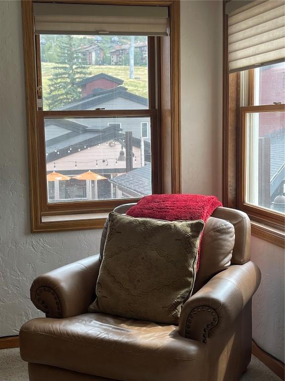 sitting room featuring a textured wall