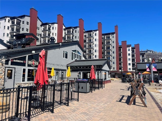 view of building exterior featuring fence