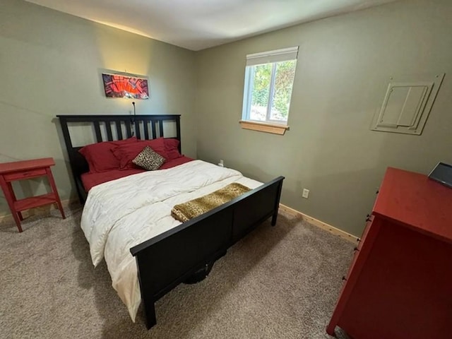 bedroom featuring carpet flooring and baseboards