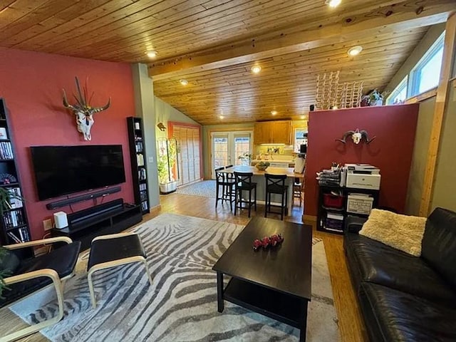 living room featuring wood ceiling, vaulted ceiling, and light wood-style flooring