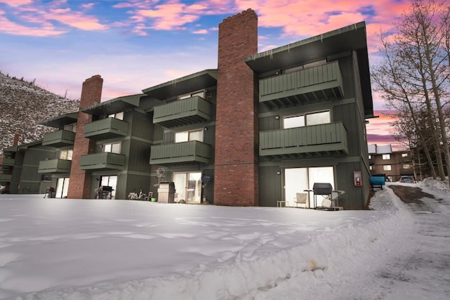 view of snow covered building