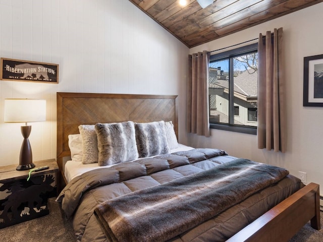 carpeted bedroom with wood ceiling and vaulted ceiling