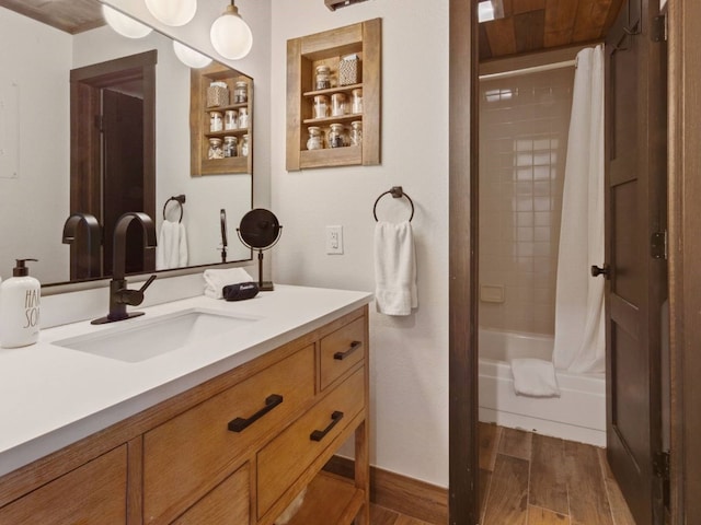 bathroom featuring shower / tub combo with curtain and vanity