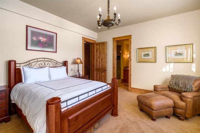 bedroom with light colored carpet and an inviting chandelier