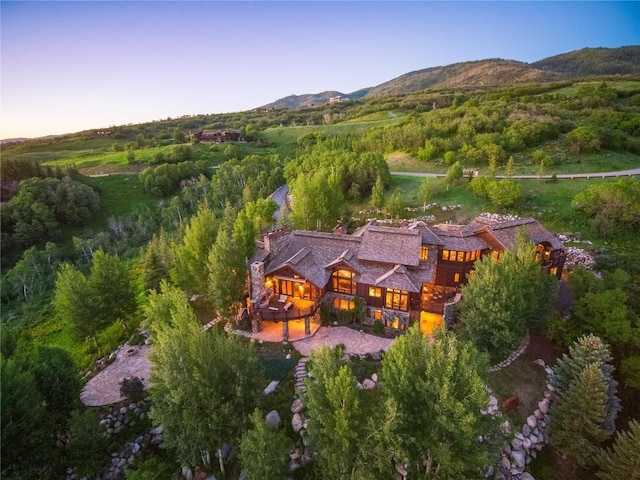 aerial view at dusk with a mountain view