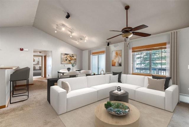 living room featuring ceiling fan, lofted ceiling, light colored carpet, and track lighting