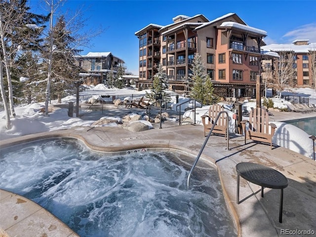 view of snow covered pool