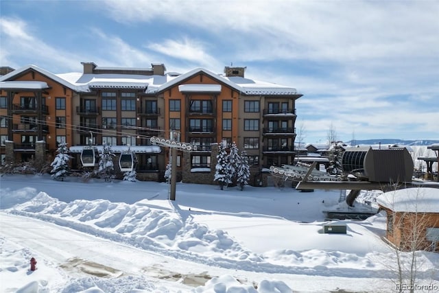 view of snow covered building