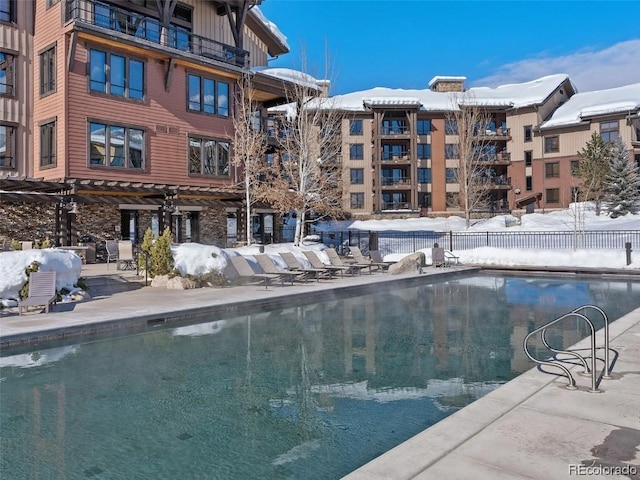 view of snow covered pool