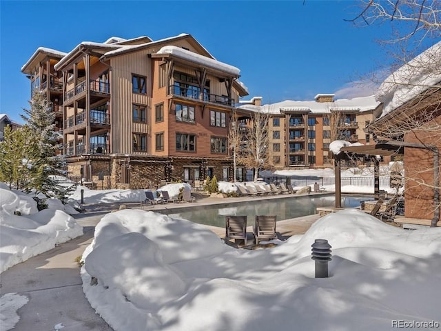 view of snow covered property