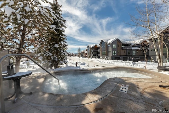 view of snow covered pool