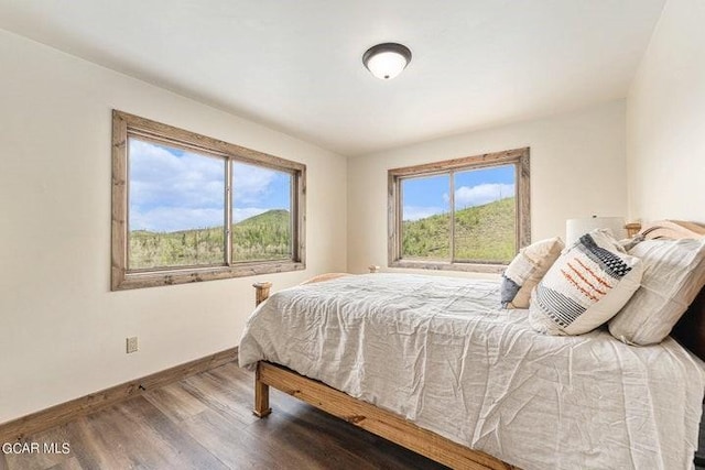 bedroom featuring hardwood / wood-style floors