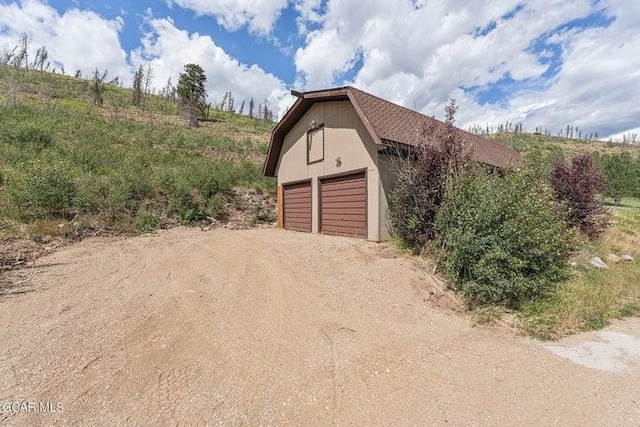 garage with a rural view