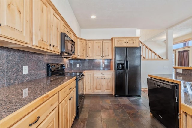 kitchen featuring tasteful backsplash, light brown cabinets, and black appliances