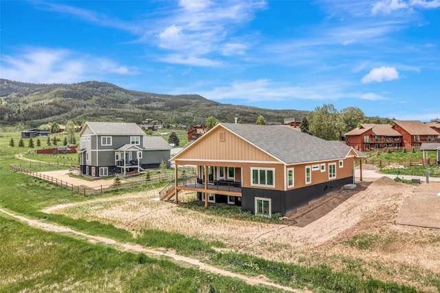 exterior space featuring a mountain view